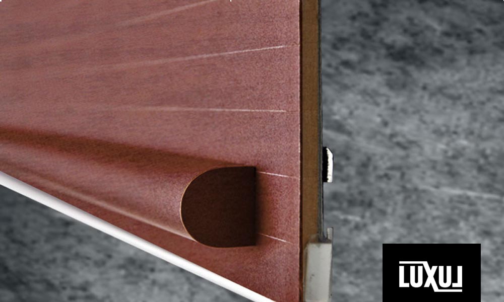 Timber veneer tambour door with a bullnosed handle